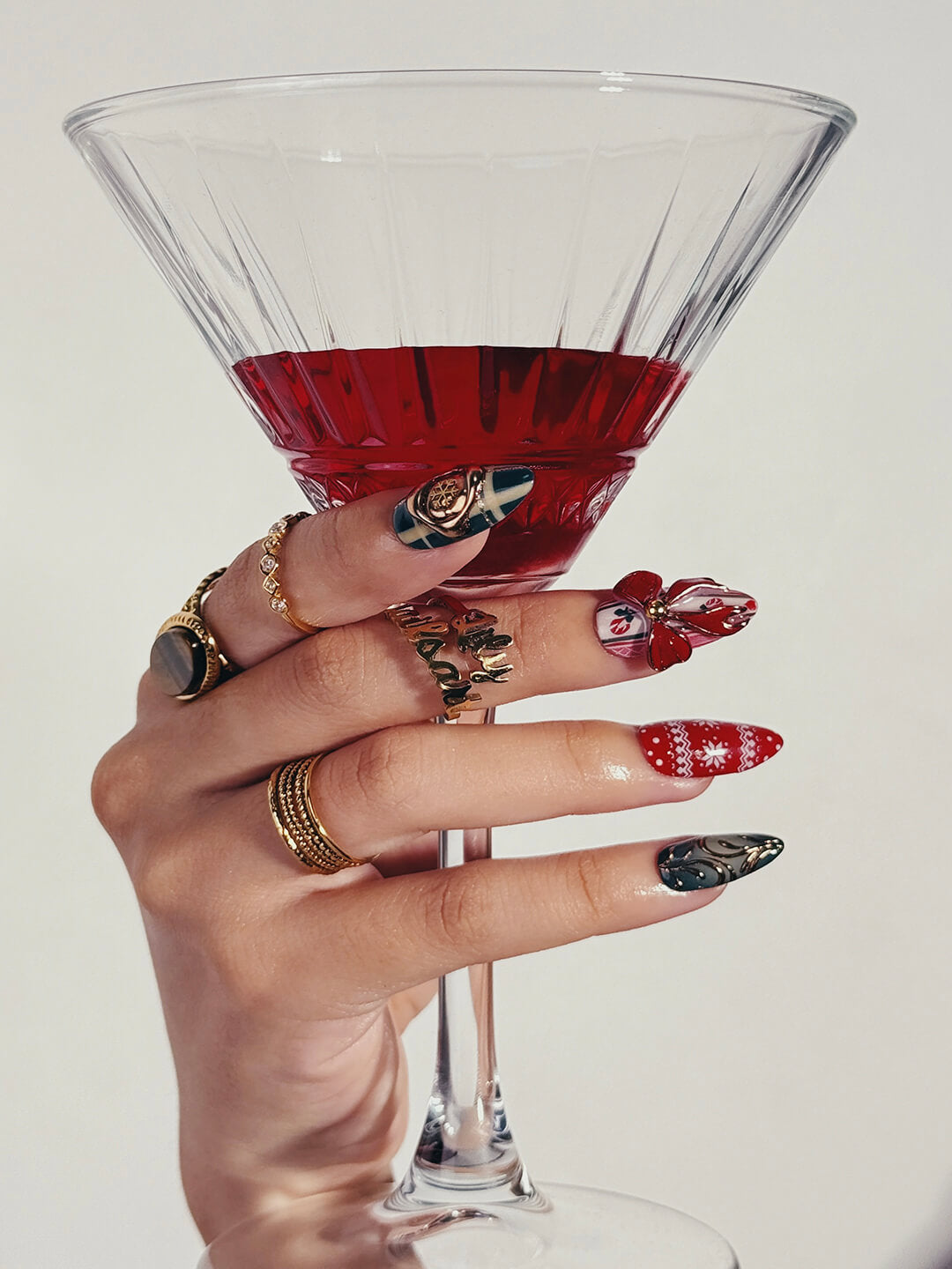 3D maximalist Christmas press-on nails with plaid, ornaments, snowflakes, and bows in red, green, and gold — handmade nail art, luxury press-on nails, reusable false nails, perfect for holiday glam or festive gifts.