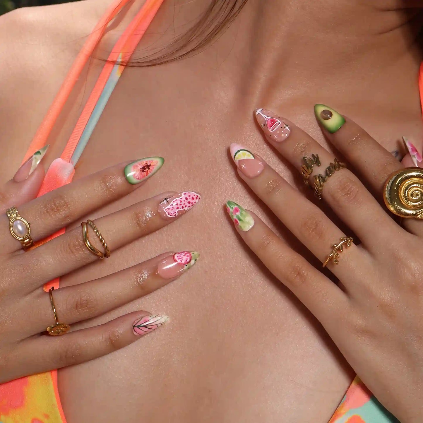 Handmade summer press-on nails with hand-painted avocado, wine glass, lime slice, pink leopard and tropical floral art by Lily Nails Art