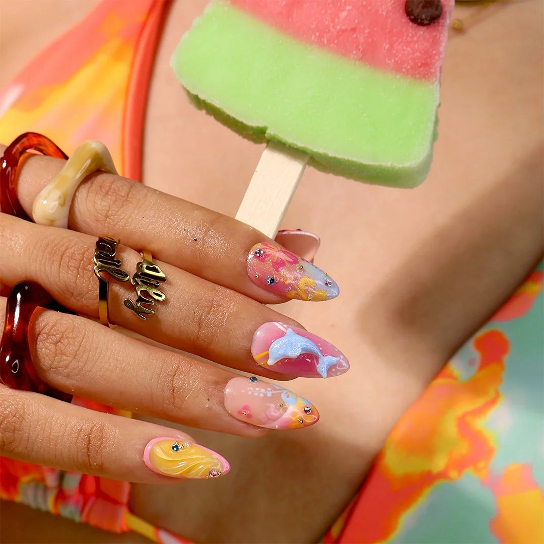 Handmade summer press-on nails with vibrant multicolor tropical floral art and bold pop energy inspired by Zara Larson , y2k nails by lilynailsart