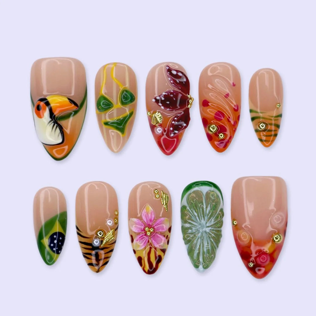 Handmade summer press-on nails with Brazil-inspired toucan, Brazilian flag, tiger stripes and tropical floral art by Lily Nails Art