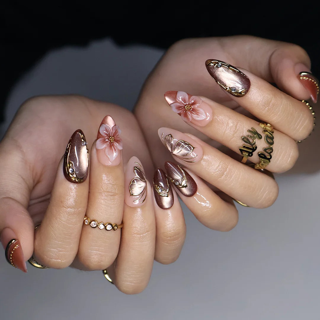 Papillon handmade fall press-on nails — almond set in nude, mauve and chocolate cat-eye with 3D pink lilies and gold butterfly-wing linework