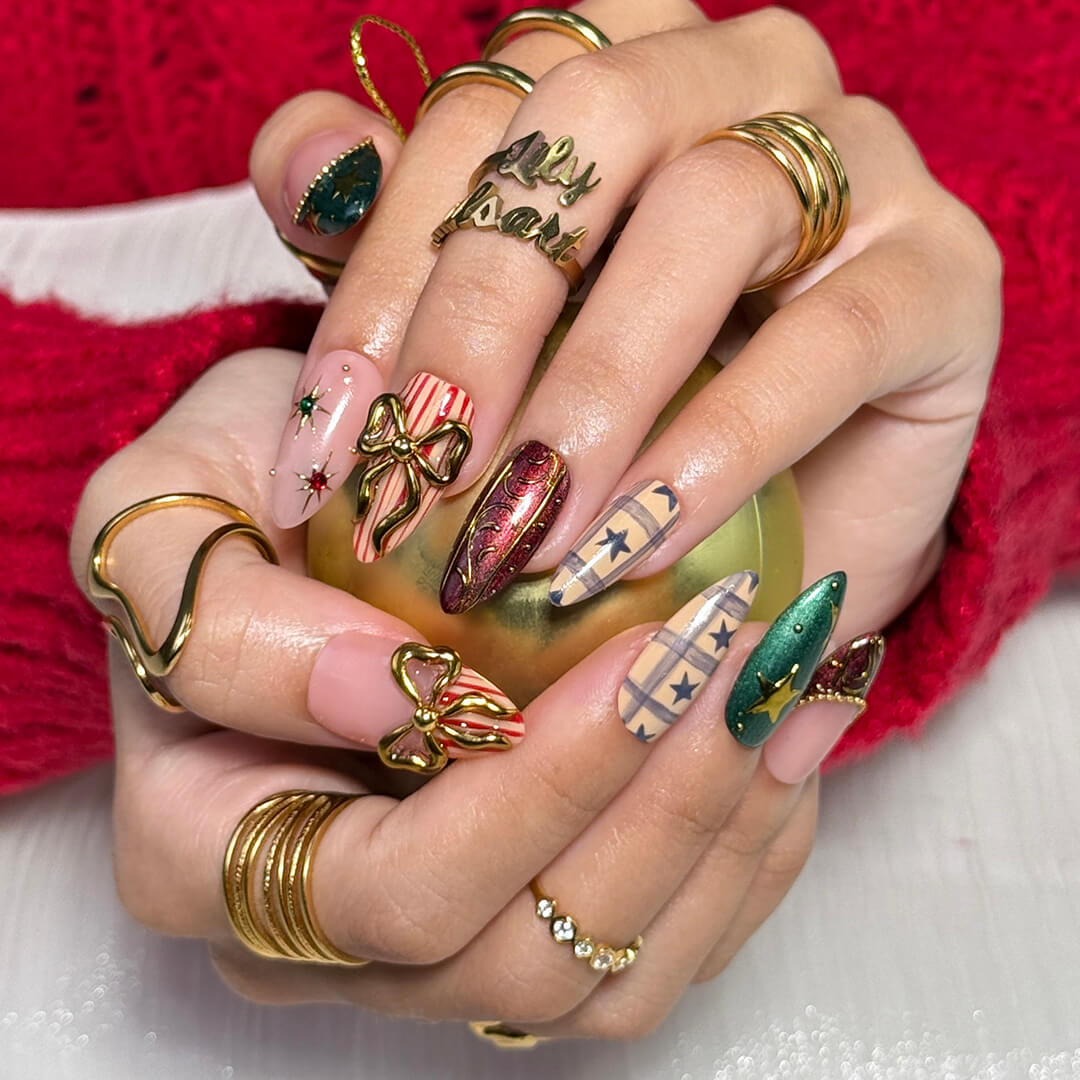3D red and green custom Christmas press on nails with gold star accents, metallic bows, candy cane stripes, and plaid designs — holiday fake nails, handmade false nails, luxury pressons — perfect for winter parties or as a festive gift idea