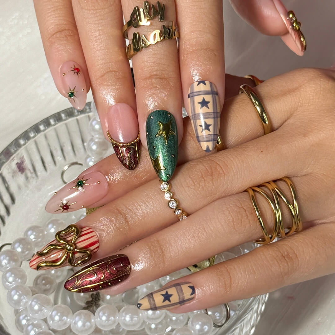 3D red and green custom Christmas press on nails with gold star accents, metallic bows, candy cane stripes, and plaid designs — holiday fake nails, handmade false nails, luxury pressons — perfect for winter parties or as a festive gift idea