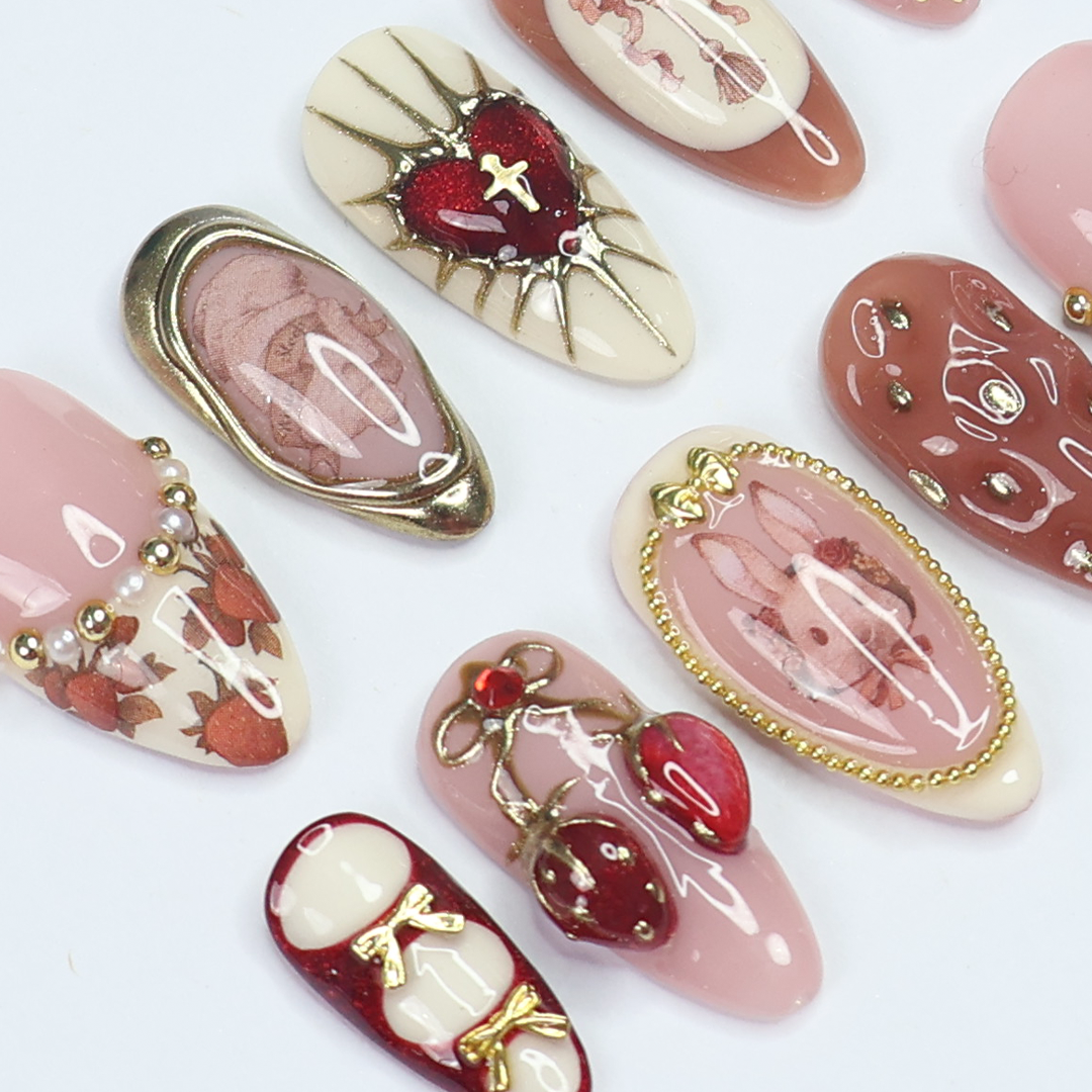 3D cute strawberry and bunny press on nails with pearl accents, heart charms, metallic gold bows, and vintage art details — luxury handmade press on nails, premium custom nail art, cute Japanese nail design, false nails, fake nails, pressons — perfect for birthdays, gifts, cosplay, or kawaii fashion lovers.