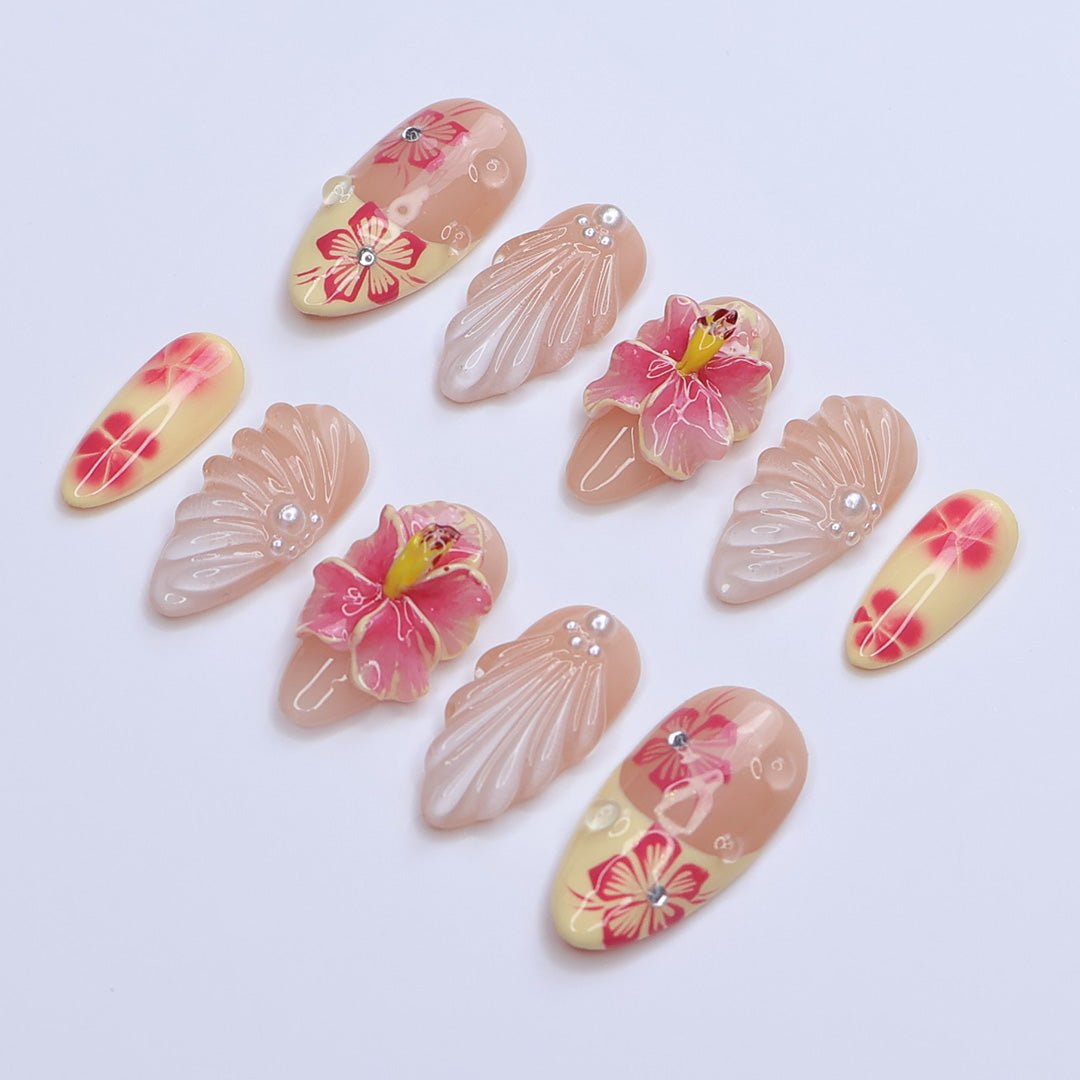 3D tropical summer press on nails with pink hibiscus flowers, seashell textures, and soft yellow tips, embellished with pearls and rhinestones — featuring sculpted petals, glossy finishes, and floral beach vibes — summer vacation nails, tropical flower press on nails, custom handmade nail art, fake nails, false nails, pressons — perfect for summer holidays, beach trips, or destination weddings.