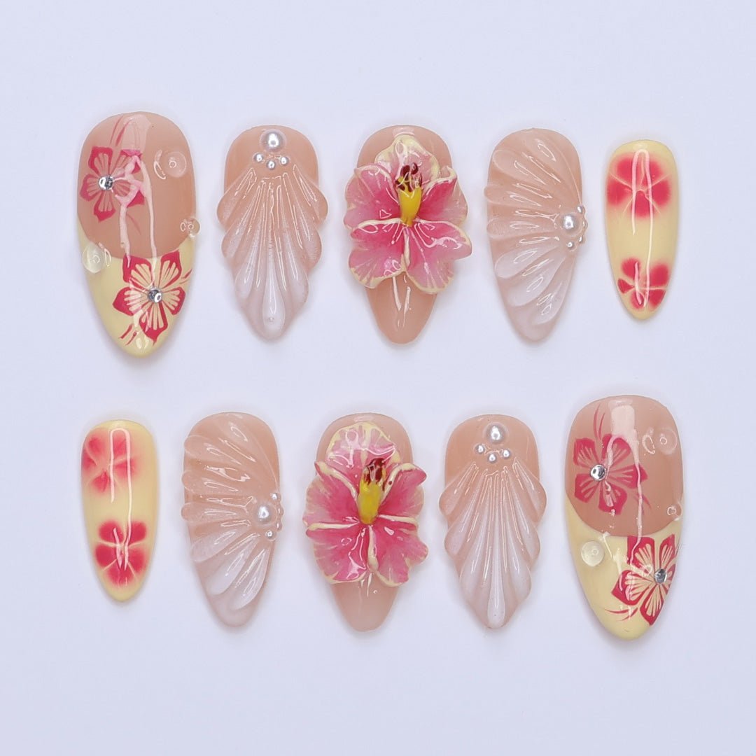 3D tropical summer press on nails with pink hibiscus flowers, seashell textures, and soft yellow tips, embellished with pearls and rhinestones — featuring sculpted petals, glossy finishes, and floral beach vibes — summer vacation nails, tropical flower press on nails, custom handmade nail art, fake nails, false nails, pressons — perfect for summer holidays, beach trips, or destination weddings.