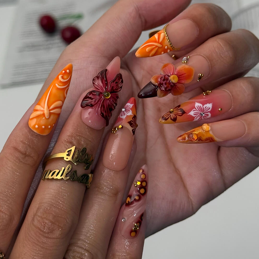 Luxury press-on nails with fiery red and orange gradients, 3D florals, golden flecks, and shimmering accents inspired by dragonfly — handmade long almond nails — perfect for bold fall looks, holiday, birthday