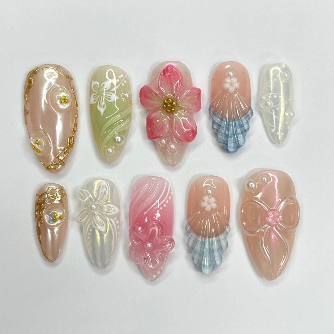 Garden Whisper - Spring Summer Collection Handmade Pastel Floral Press-On Nails – soft pink, green, and pearl tones with 3D flowers, ribbons, and intricate designs. Perfect for birthdays, weddings, vacations, or as a thoughtful gift for her.