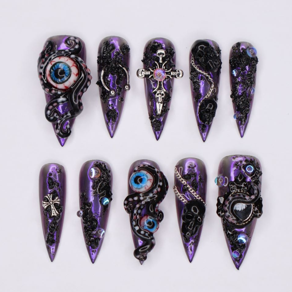 Black and purple chrome press on nails with eerie, horror-inspired handmade 3D elements — custom gothic nails, stiletto press ons, handmade false nails, spooky nail art — perfect for Halloween season, alt fashion, and dark feminine energy.