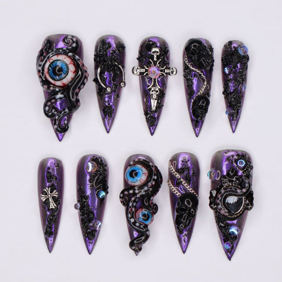 Black and purple chrome press on nails with eerie, horror-inspired handmade 3D elements — custom gothic nails, stiletto press ons, handmade false nails, spooky nail art — perfect for Halloween season, alt fashion, and dark feminine energy.