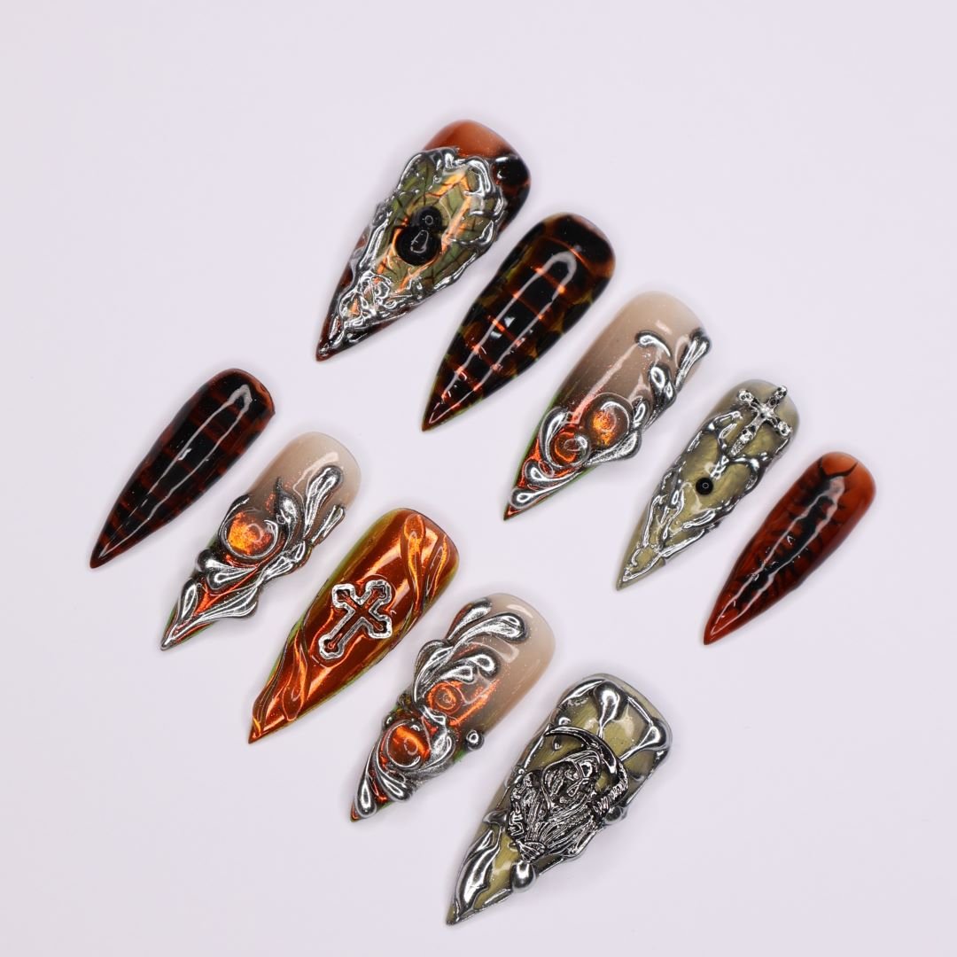down view of gothic metal knight nails press on nails fake nails pressons amber press on nails amber metalic press on nails