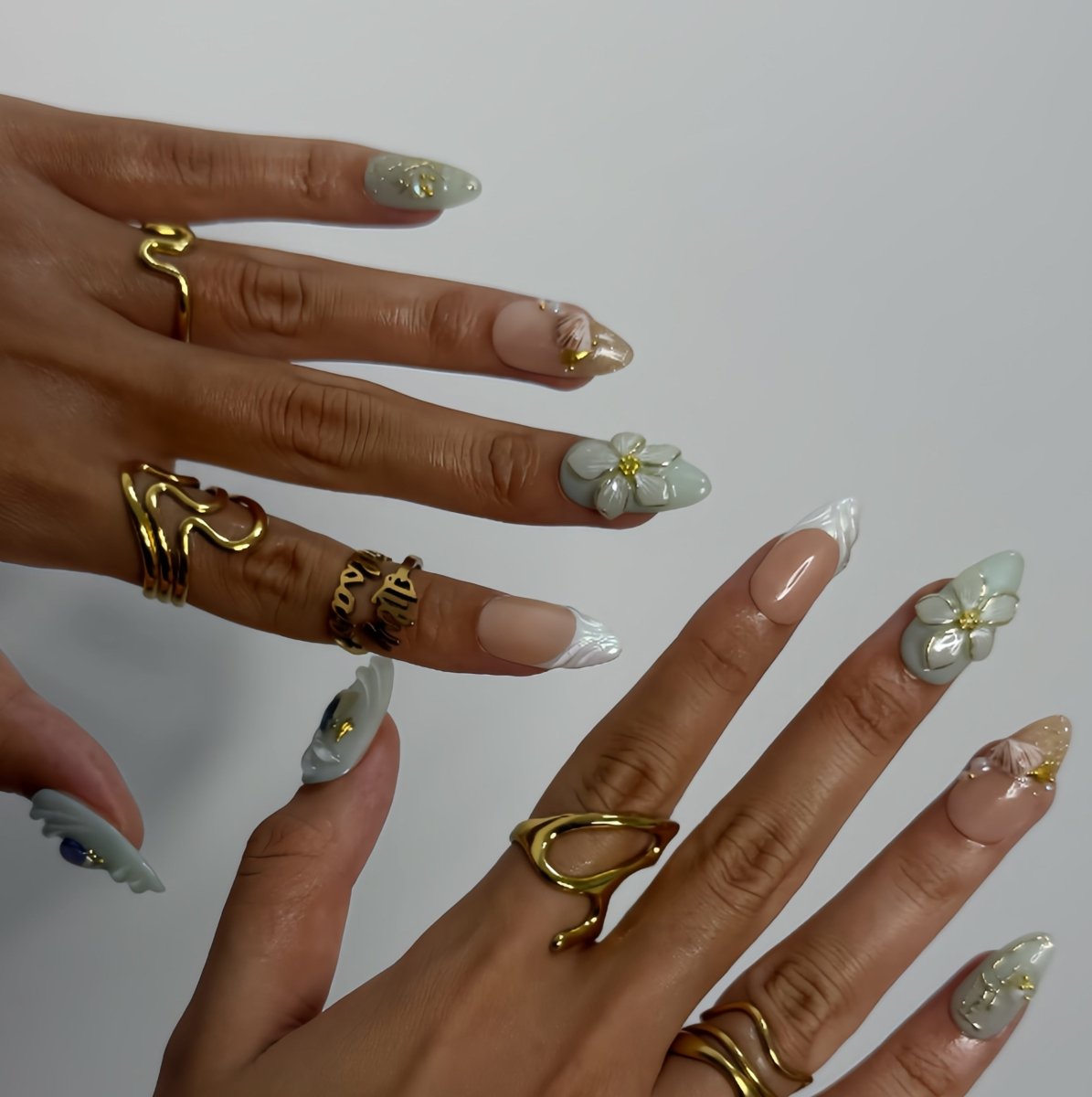 3D seafoam press-on nails with pearl flower accents, gold seashells, and iridescent wave textures — handmade luxury nail art, reusable and custom-sized false nails in a soft pastel green and nude colorway — perfect for beach weddings, summer travel, or romantic coastal looks.