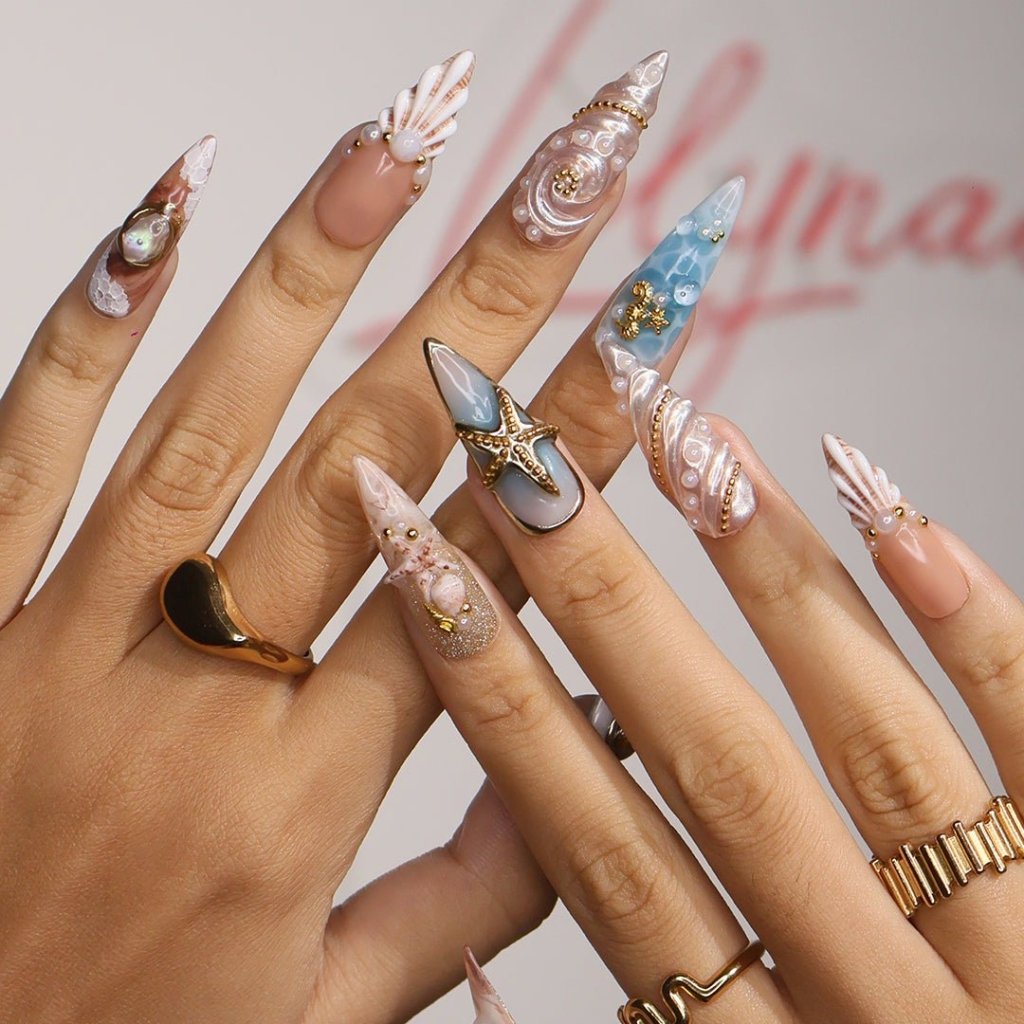 3D ocean press on nails with starfish, seashells, pearls, and turtles — featuring marble wave textures, gold accents, and sculpted shell designs in sandy nude, pearl white, and ocean blue tones — summer vacation nails, beach press on nails, custom handmade nail art, fake nails, false nails, pressons — perfect for coastal getaways, mermaid vibes, or tropical gifting.