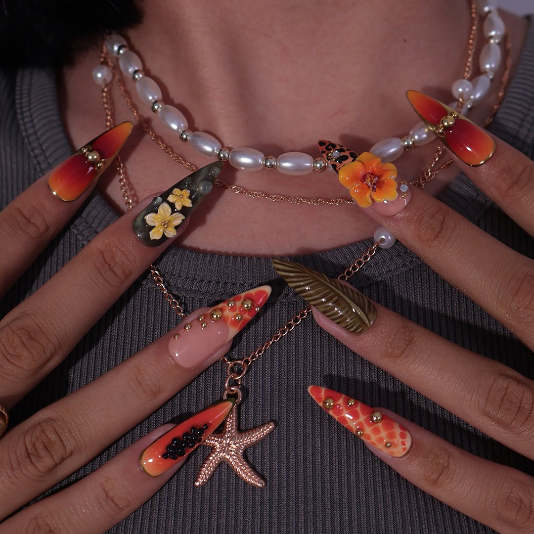 3D tropical press on nails with sunset ombré, hibiscus flowers, leopard print, and jungle leaves in orange and olive tones — summer vacation nails, tropical handmade nail art, fake nails, false nails, pressons — perfect for beach getaways or statement summer looks.