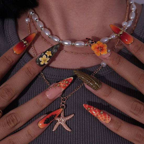 3D tropical press on nails with sunset ombré, hibiscus flowers, leopard print, and jungle leaves in orange and olive tones — summer vacation nails, tropical handmade nail art, fake nails, false nails, pressons — perfect for beach getaways or statement summer looks.