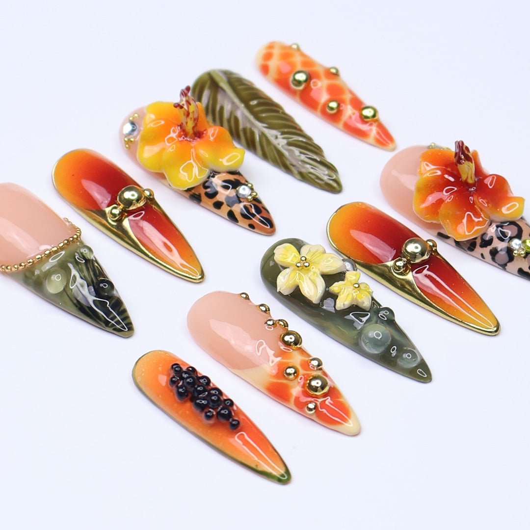 3D tropical press on nails with sunset ombré, hibiscus flowers, leopard print, and jungle leaves in orange and olive tones — summer vacation nails, tropical handmade nail art, fake nails, false nails, pressons — perfect for beach getaways or statement summer looks.
