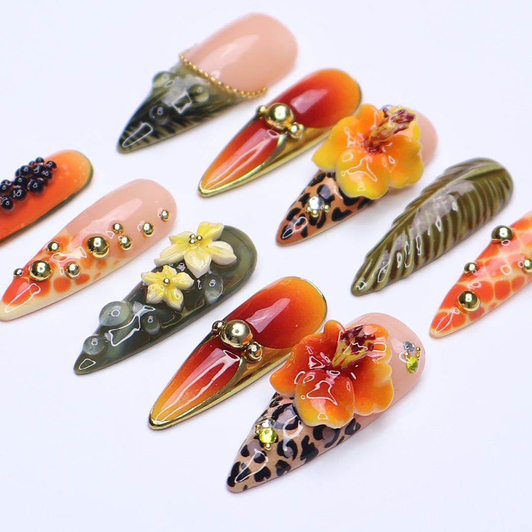3D tropical press on nails with sunset ombré, hibiscus flowers, leopard print, and jungle leaves in orange and olive tones — summer vacation nails, tropical handmade nail art, fake nails, false nails, pressons — perfect for beach getaways or statement summer looks.