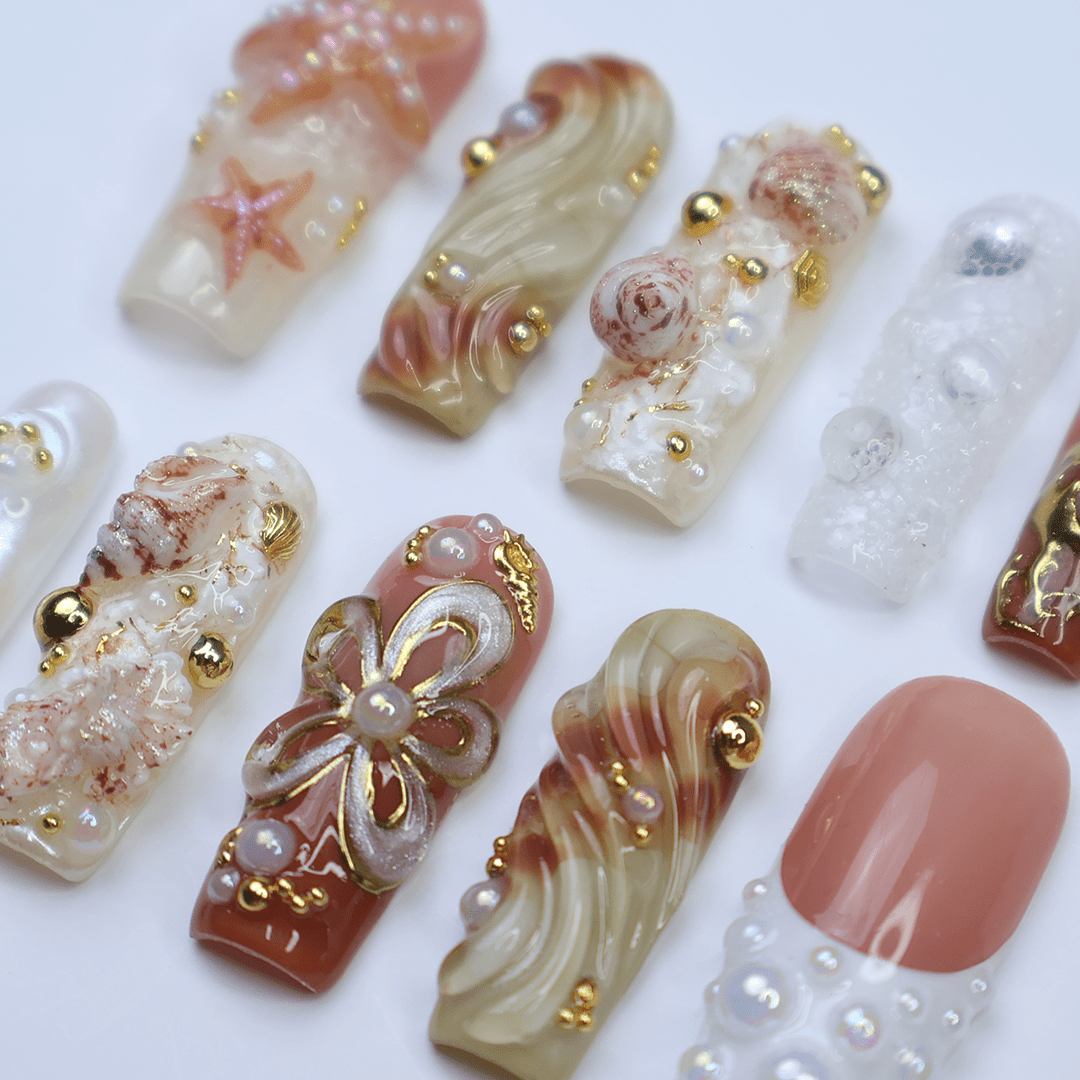 3D luxury beach press on nails with starfish, seashells, pearl clusters, and gold embellishments — featuring sculpted waves, iridescent textures, metallic accents, and under-the-sea details in nude, ivory, and sand tones — summer vacation nails, ocean press on nails, custom handmade nail art, fake nails, false nails, pressons — perfect for coastal getaways, beach photoshoots, or elegant summer looks.
