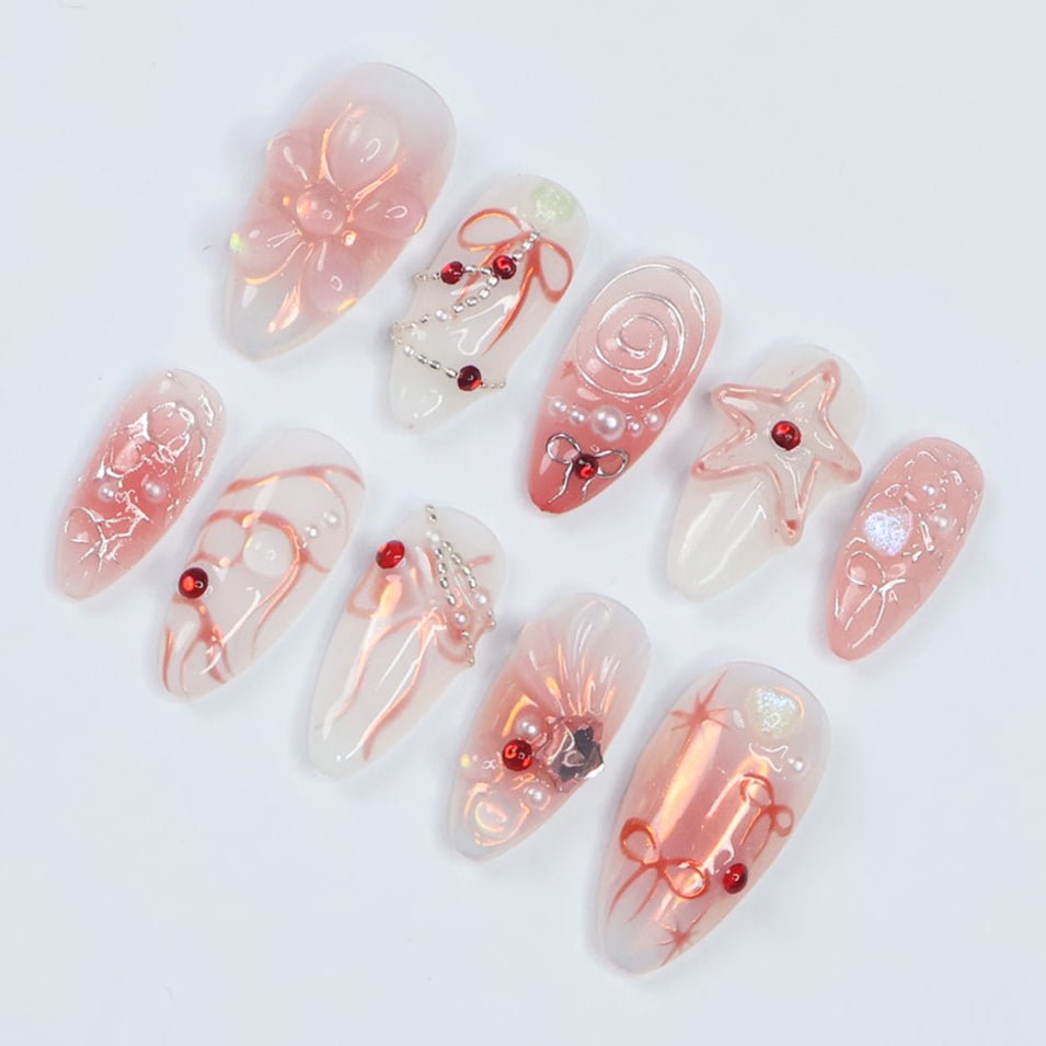 Blush pink press-on nails with 3D bows and shimmering accents, ideal holiday nails, birthday nails, spring nails, or a thoughtful gift for her.