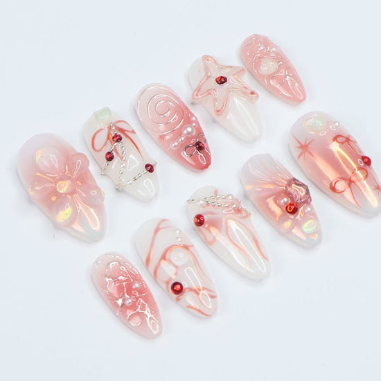 Blush pink press-on nails with 3D bows and shimmering accents, ideal holiday nails, birthday nails, spring nails, or a thoughtful gift for her.