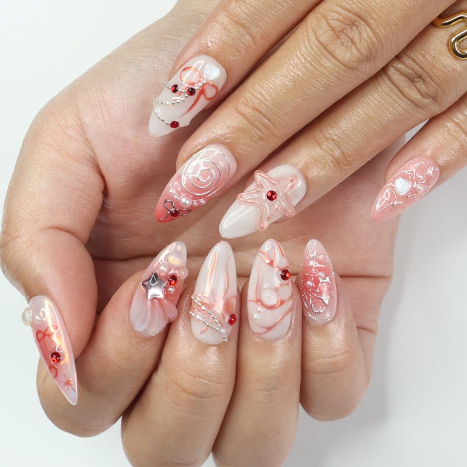 Blush pink press-on nails with 3D bows and shimmering accents, ideal holiday nails, birthday nails, spring nails, or a thoughtful gift for her.