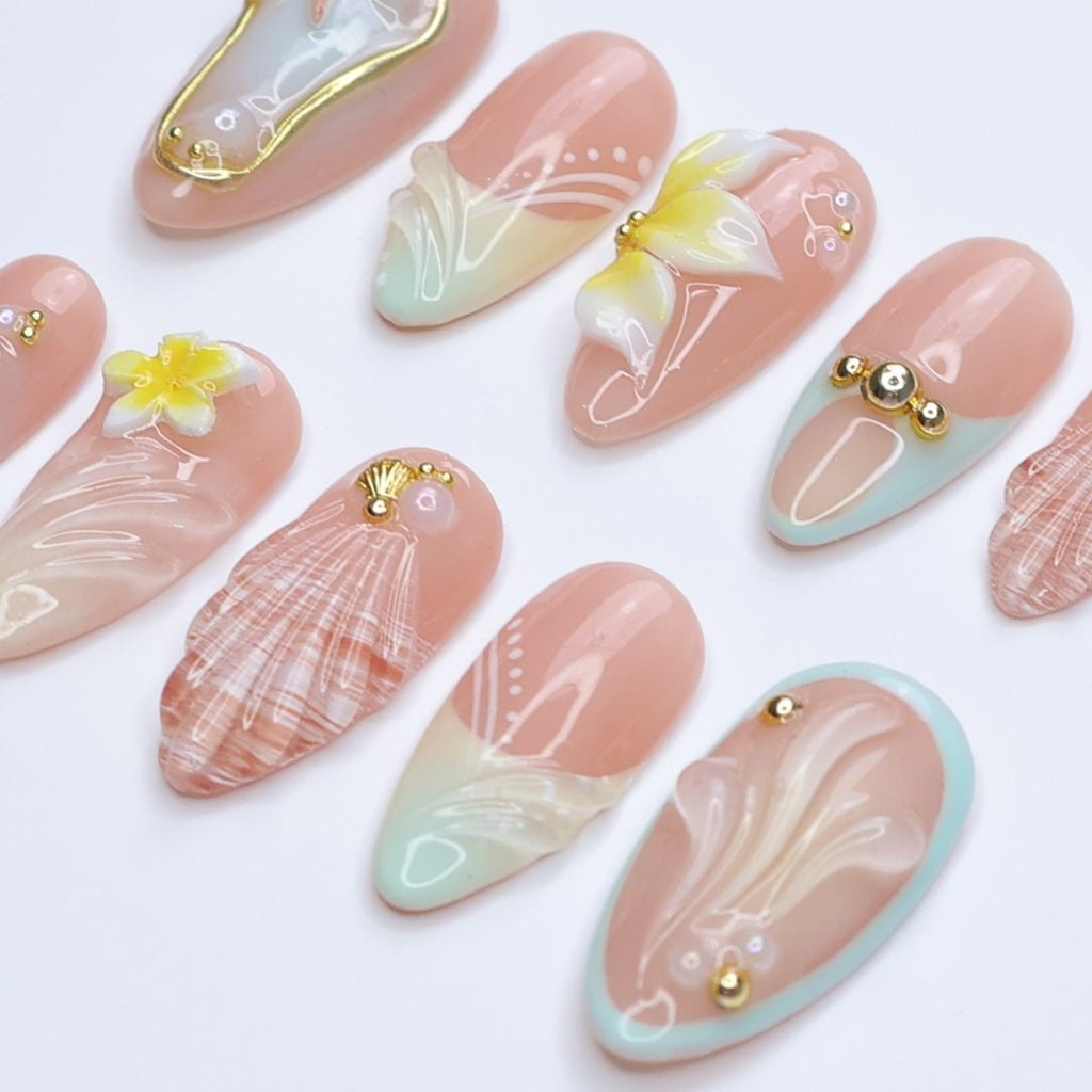 3D beach press on nails with seashells, starfish, plumeria flowers, and soft pastel waves, featuring gold charms, pearl details, and glossy ocean-inspired accents — summer vacation nails, ocean press on nails, custom handmade nail art, fake nails, false nails, pressons — perfect for tropical getaways, beach weddings, or gifting for her.
