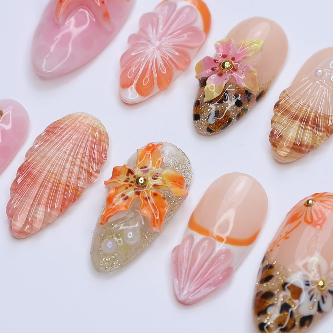 3D beach-themed summer press on nails with starfish, seashells, leopard print, and tropical flower accents, featuring soft pink and coral tones, gold glitter, and sculpted sea elements — summer vacation nails, ocean press on nails, custom handmade nail art, fake nails, false nails, pressons — perfect for tropical getaways, cruises, or summer gifting.