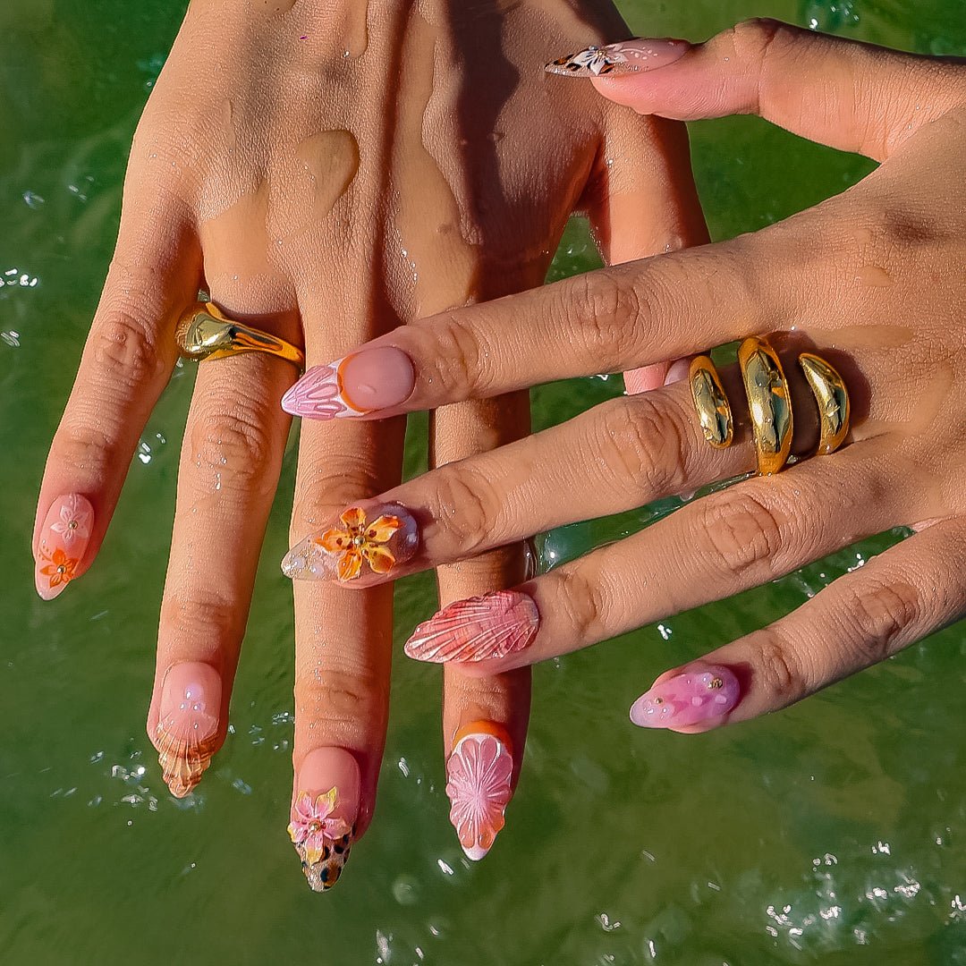 3D beach-themed summer press on nails with starfish, seashells, leopard print, and tropical flower accents, featuring soft pink and coral tones, gold glitter, and sculpted sea elements — summer vacation nails, ocean press on nails, custom handmade nail art, fake nails, false nails, pressons — perfect for tropical getaways, cruises, or summer gifting.