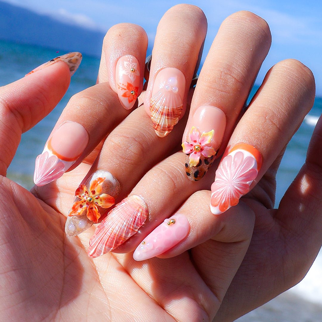 3D beach-themed summer press on nails with starfish, seashells, leopard print, and tropical flower accents, featuring soft pink and coral tones, gold glitter, and sculpted sea elements — summer vacation nails, ocean press on nails, custom handmade nail art, fake nails, false nails, pressons — perfect for tropical getaways, cruises, or summer gifting.