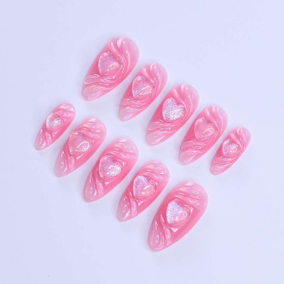 Handmade Pink Heart Press-On Nails – Valentine Collection - soft pink tones with shimmering 3D heart accents. Perfect for Valentine’s Day, anniversaries, birthdays, or as a romantic gift for her.