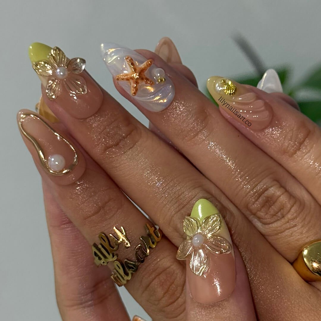 3D summer nails with sculpted shells, pearl flowers, flip-flop charms, and ocean swirl textures — luxury handmade nail art with earthy sage, cream, and amber tones — perfect for beach weddings, coastal getaways, or understated summer elegance.