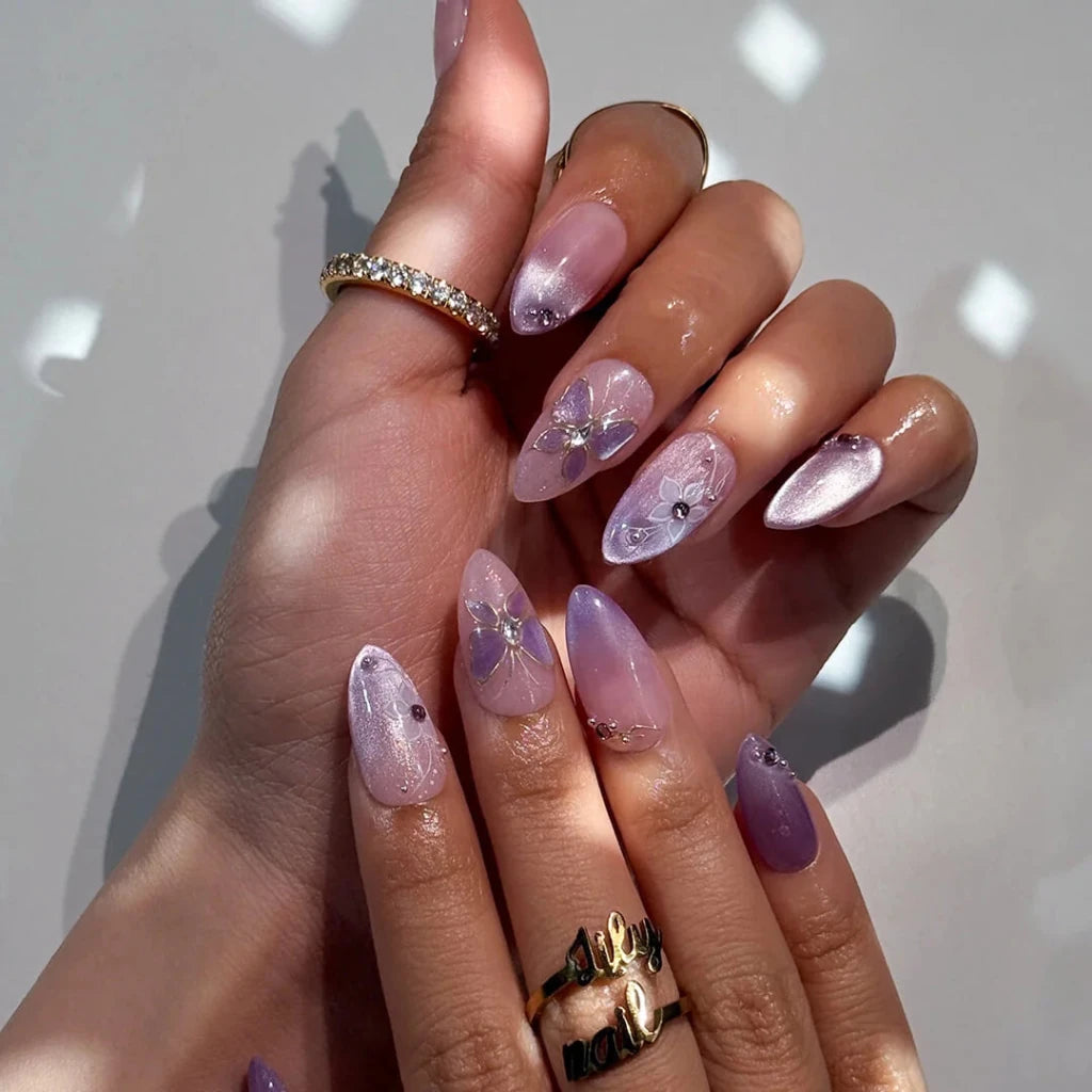 3D lavender ombré press on nails with gold butterfly motif, embellished with white floral accents and crystals — custom press on nails, luxury handmade nail art, fake nails, false nails, pressons — perfect for prom, spring events, and fairy-tale aesthetics