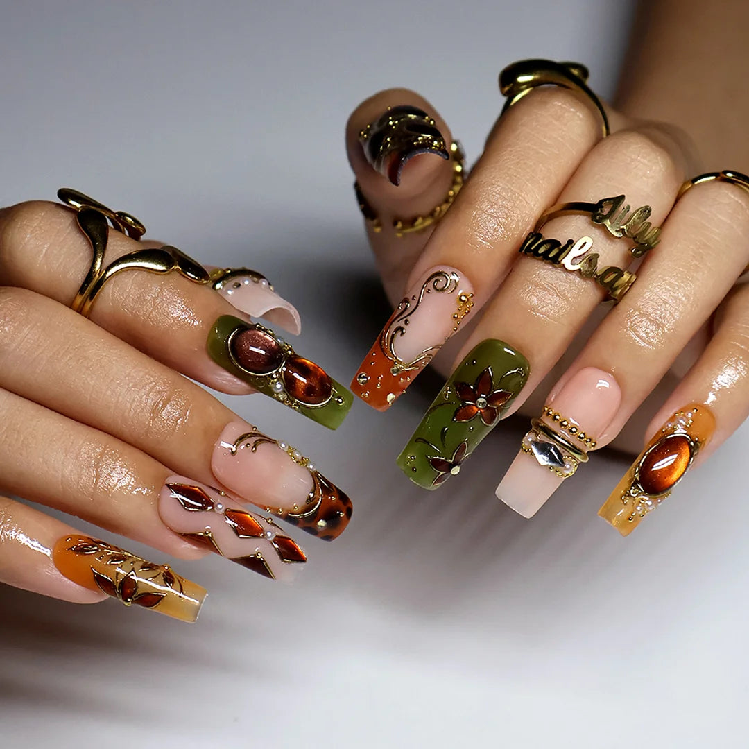 tertoise brown & green handmade fall press-on nails — maximalist long square set with amber gemstones, gold filigree and floral detail
