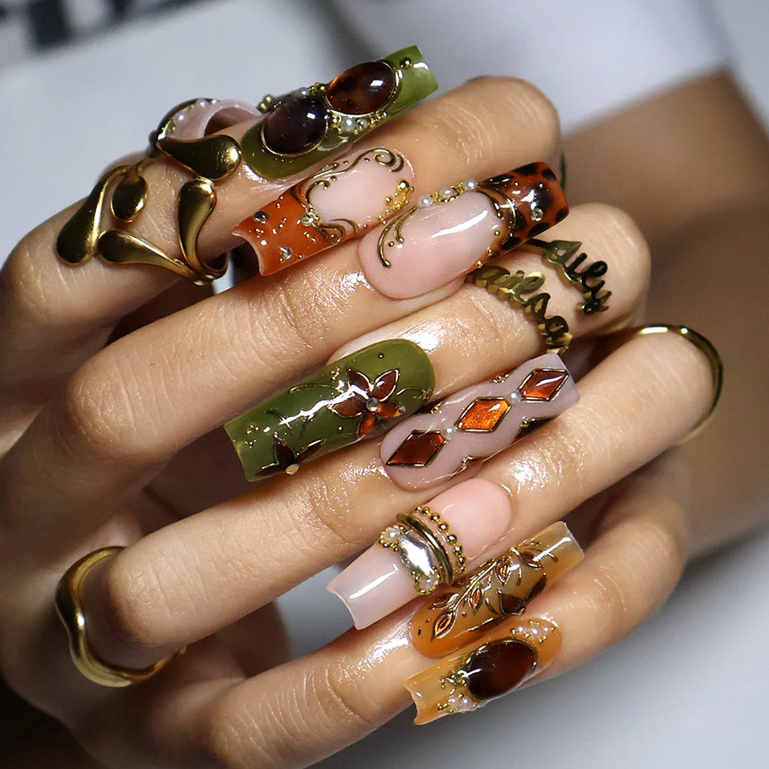 tertoise brown & green handmade fall press-on nails — maximalist long square set with amber gemstones, gold filigree and floral detail
