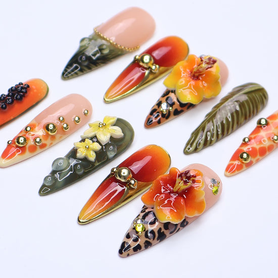 3D tropical press on nails with sunset ombré, hibiscus flowers, leopard print, and jungle leaves in orange and olive tones — summer vacation nails, tropical handmade nail art, fake nails, false nails, pressons — perfect for beach getaways or statement summer looks.