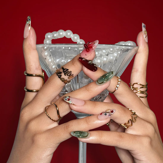 3D renaissance holiday press on nails with Christmas plaid, pearl wreath, candy cane charms, gold ornaments, and snowflake accents — handmade festive nail art for parties or gifting.