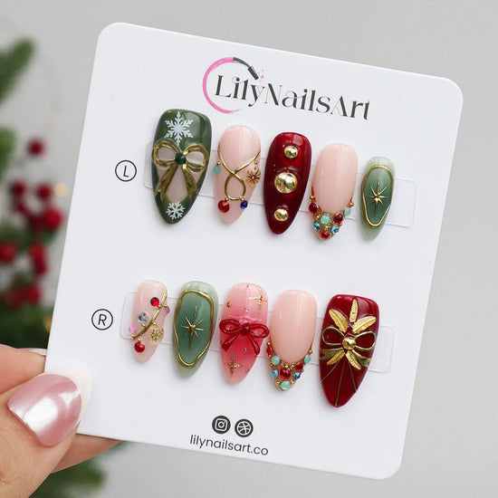 3D renaissance holiday press on nails with Christmas plaid, pearl wreath, candy cane charms, gold ornaments, and snowflake accents — handmade festive nail art for parties or gifting.