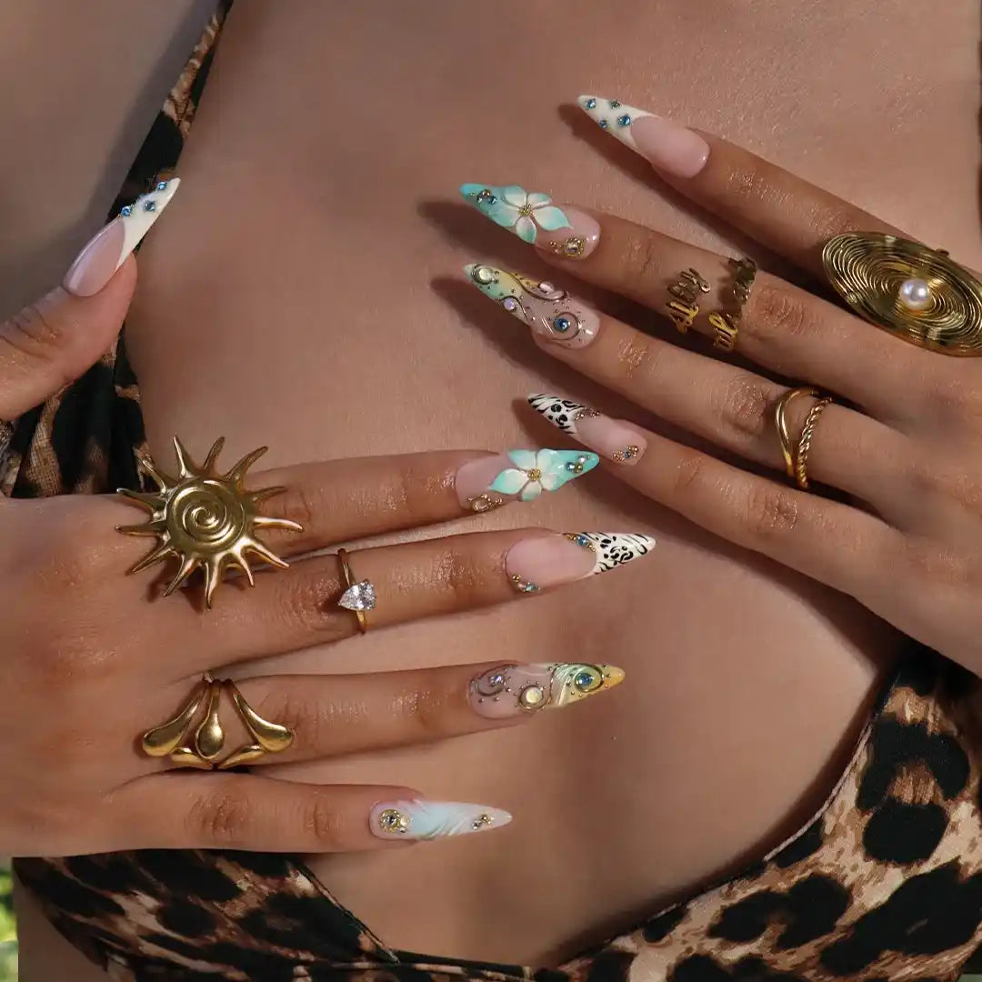 Handmade luxury summer stiletto press-on nails with aqua florals, 3D iridescent bloom, black animal print and gold crystal embellishments by Lily Nails Art
