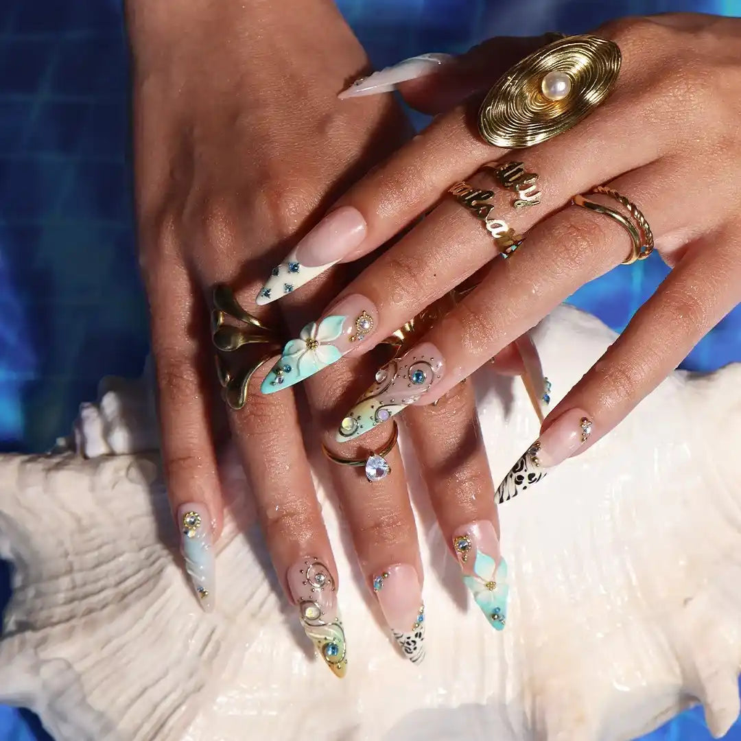Handmade luxury summer stiletto press-on nails with aqua florals, 3D iridescent bloom, black animal print and gold crystal embellishments by Lily Nails Art
