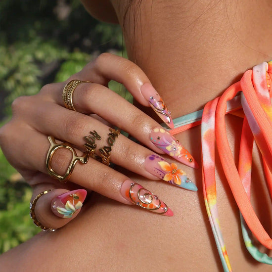 Handmade summer stiletto press-on nails with abundant multicolour florals, 3D blooms, gold spiral charms and crystal embellishments by Lily Nails Art
