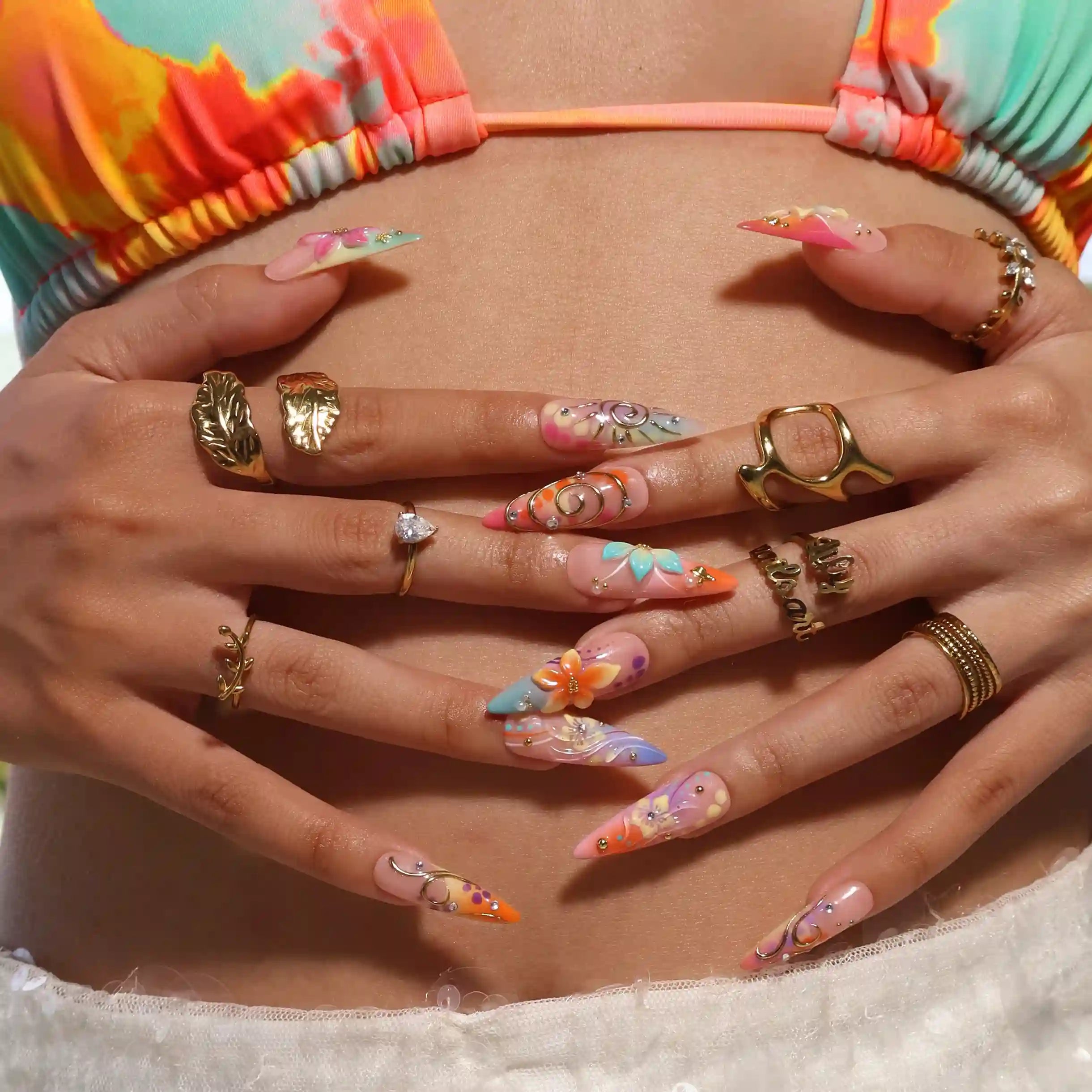 Handmade summer stiletto press-on nails with abundant multicolour florals, 3D blooms, gold spiral charms and crystal embellishments by Lily Nails Art
