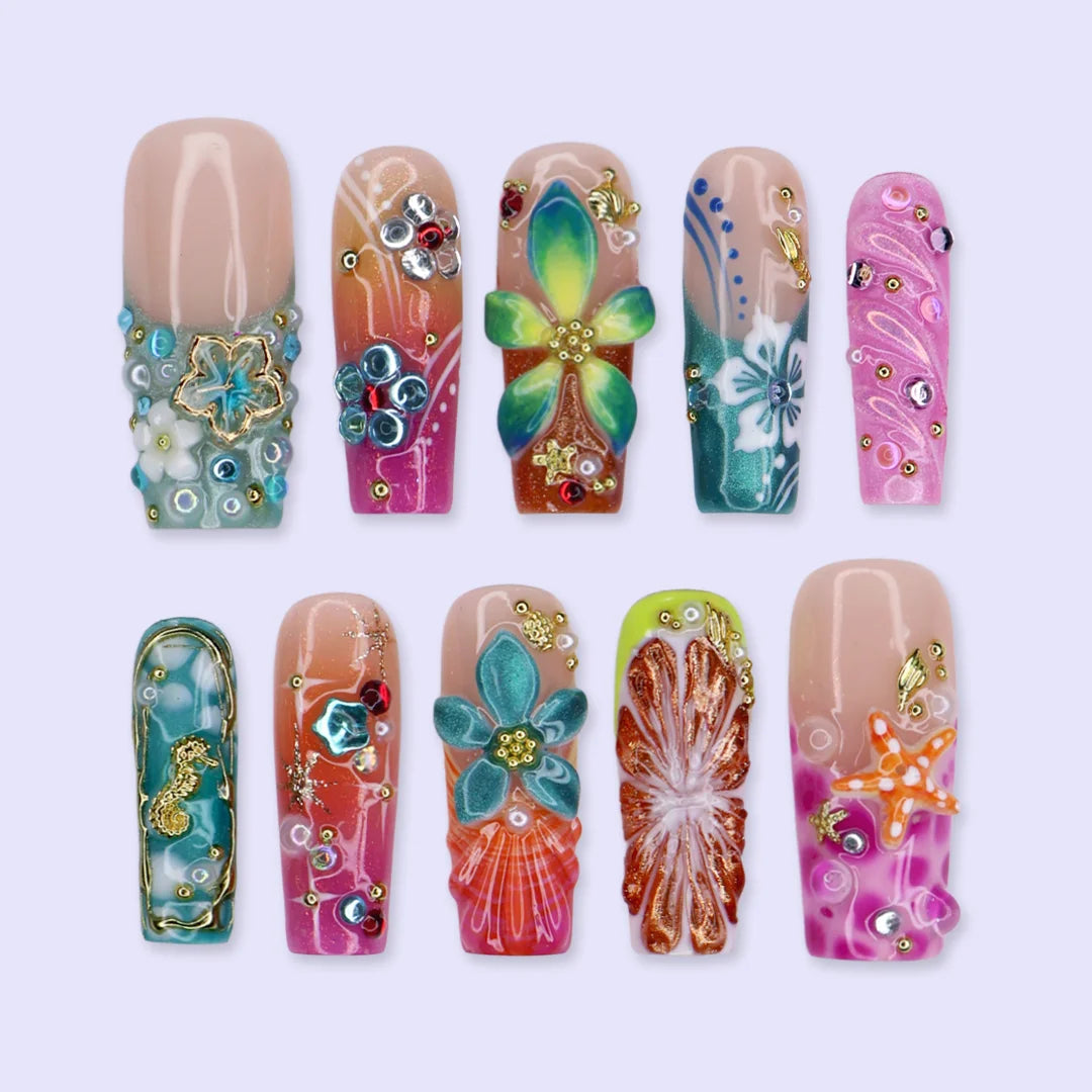 Bellini handmade summer press-on nails — maximalist long square set with 3D hibiscus, seahorse, starfish and shells in coral pink and teal
