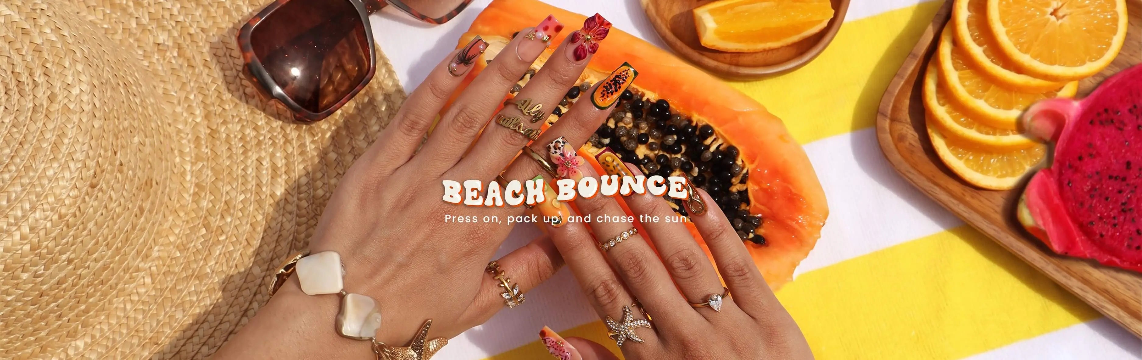a model wears tropical summer press on nails made by lilynailsart.co 