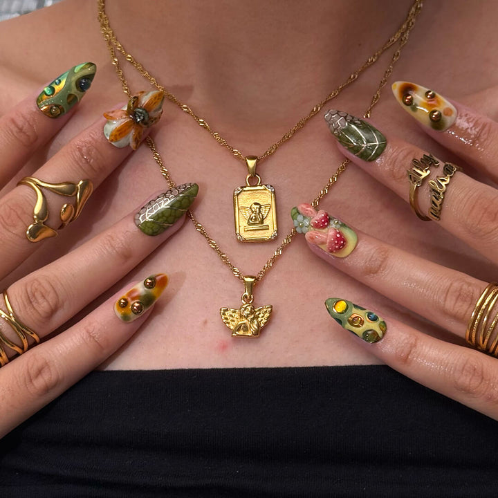 3D forest-inspired press-on nails with sculpted mushrooms, fruits, metallic leaves, and organic earthy textures in amber, moss green, and deep brown tones — luxury handmade long almond nails — perfect for autumn styles, enchanted woodland looks, or mystical nail art for fall
