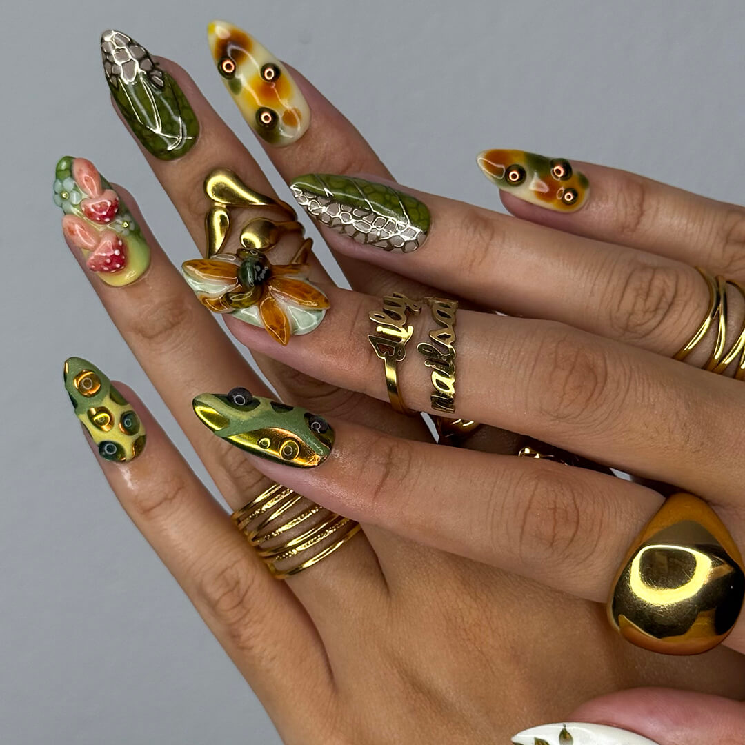 3D forest-inspired press-on nails with sculpted mushrooms, fruits, metallic leaves, and organic earthy textures in amber, moss green, and deep brown tones — luxury handmade long almond nails — perfect for autumn styles, enchanted woodland looks, or mystical nail art for fall
