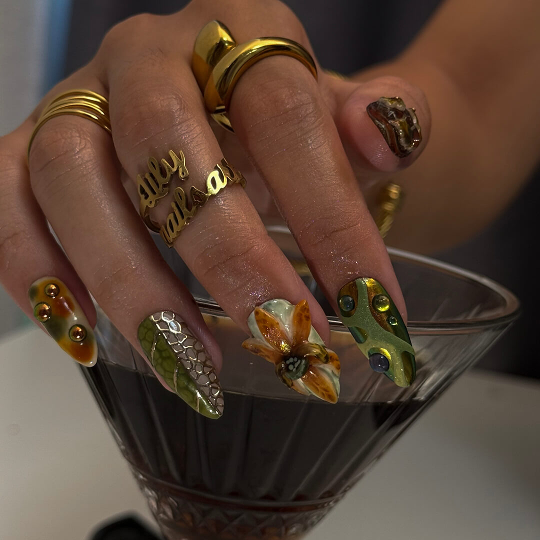 3D forest-inspired press-on nails with sculpted mushrooms, fruits, metallic leaves, and organic earthy textures in amber, moss green, and deep brown tones — luxury handmade long almond nails — perfect for autumn styles, enchanted woodland looks, or mystical nail art for fall