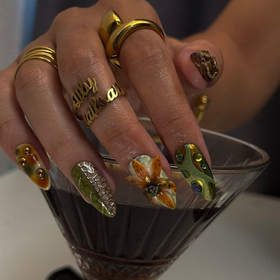 3D forest-inspired press-on nails with sculpted mushrooms, fruits, metallic leaves, and organic earthy textures in amber, moss green, and deep brown tones — luxury handmade long almond nails — perfect for autumn styles, enchanted woodland looks, or mystical nail art for fall