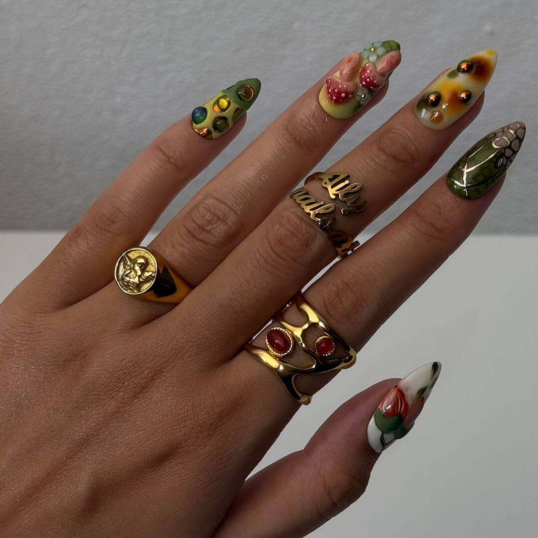 3D forest-inspired press-on nails with sculpted mushrooms, fruits, metallic leaves, and organic earthy textures in amber, moss green, and deep brown tones — luxury handmade long almond nails — perfect for autumn styles, enchanted woodland looks, or mystical nail art for fall