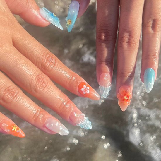 Handmade Tropical Ocean Press-On Nails – vibrant blue and coral tones with 3D seashells, flowers, starfish, and pearl accents. Perfect for  summer holidays, birthdays, vacations, or as a unique gift for her.