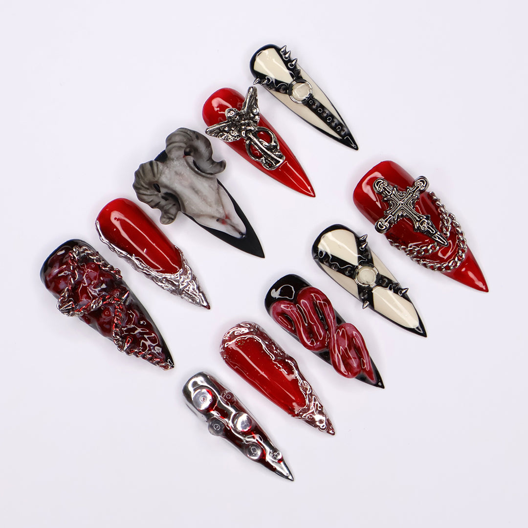 Red, black, and bone press on nails with gothic and horror-inspired 3D designs — handmade stiletto nails, custom press-ons, Halloween nail art, edgy fake nails — perfect for alt fashion, dark beauty looks, and statement nails.